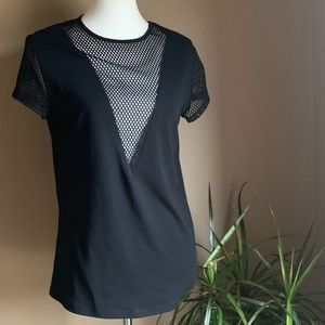 Black top with mesh deep V
